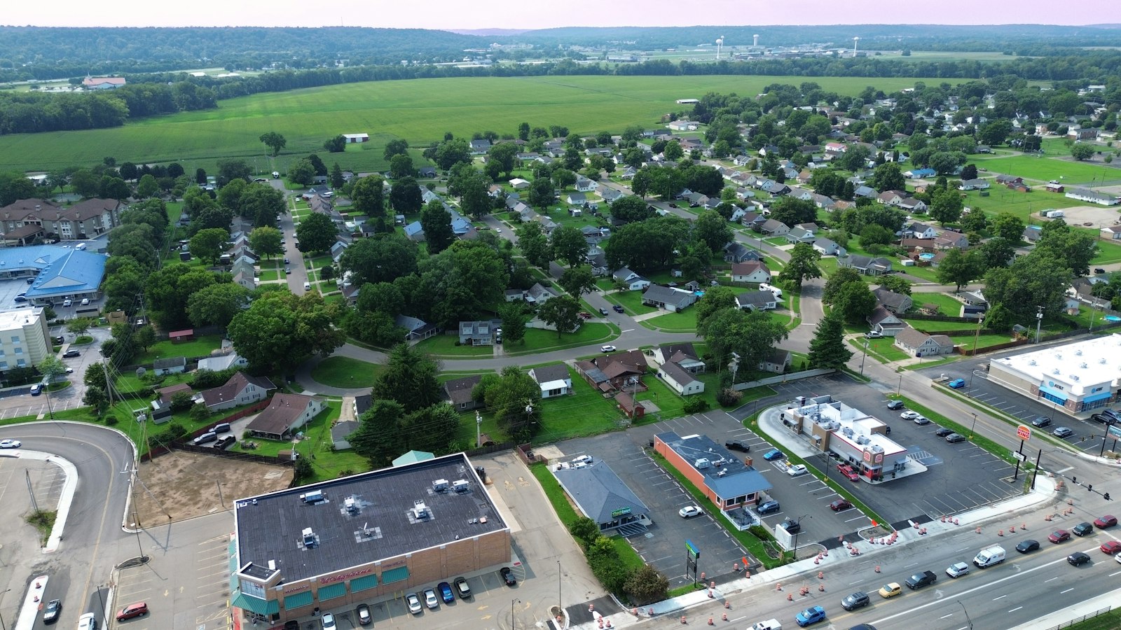 Aerial view of a mixed commercial and residential neighbourhood